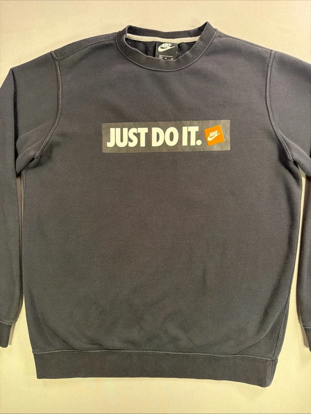 Nike Black Crewneck Sweatshirt with White 'Just Do It.' Box and Orange Tag